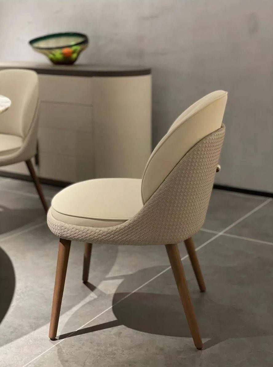 Cream upholstered chair with walnut legs