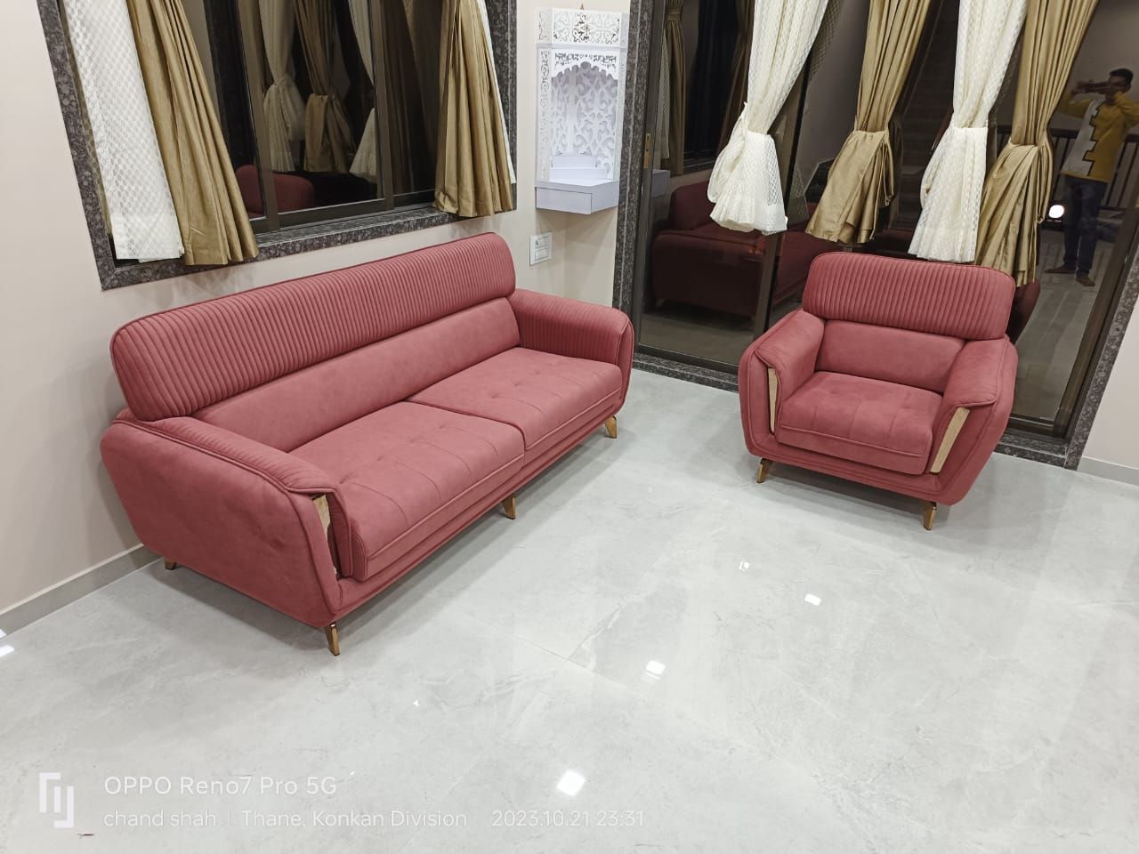 Coral channel-stitched sofa with matching armchair