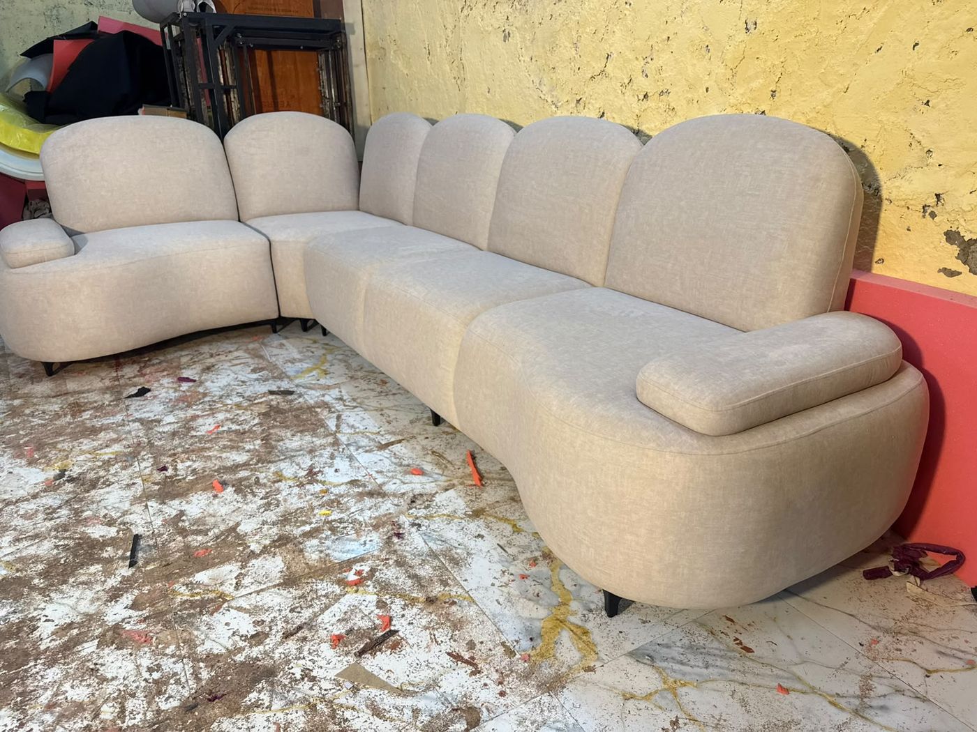 Curved ivory modular sectional